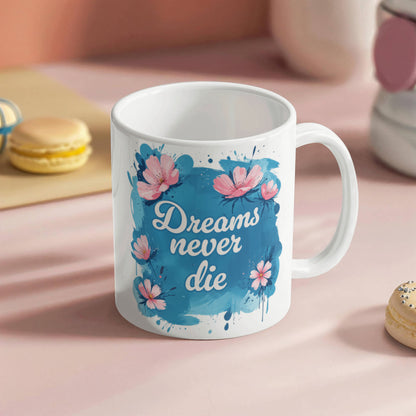 Träume sterben nie – Weiße Keramiktasse (325 ml)